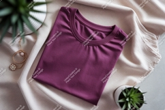 Plum t shirt draped on textured fabric image Product Image 1