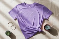 Purple t shirt knotted with succulents and jewelry Product Image 1