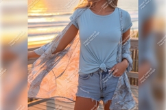Woman Wearing Tshirt Mockup With Beach Background Product Image 1