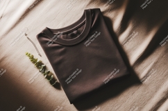 Dark brown t shirt with green leaf and necklace mockup Product Image 1