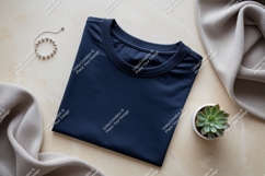 Navy blue t shirt with silver bracelet and plant mockup Product Image 1