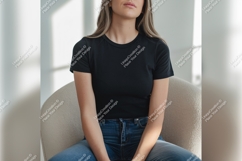 Woman Wearing Black Tshirt Mockup In Studio Product Image 1