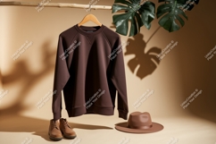 Brown sweatshirt boots hat clothing Product Image 1