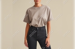 Woman Wearing Tshirt Mockup And Dark Jeans Product Image 1