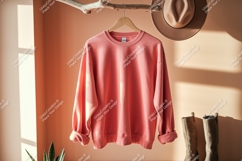 Coral sweatshirt hanging on branch clothing Product Image 1