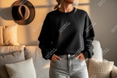 Black sweatshirt grey jeans casual indoor Mockup Product Image 1
