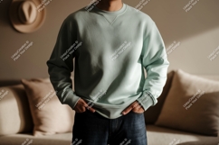 Man wearing pale blue sweatshirt clothing Product Image 1