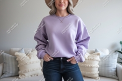 Woman wearing lavender sweatshirt and jeans image Product Image 1