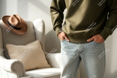 Man wearing green sweatshirt light jeans image Product Image 1