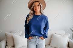 Woman wearing blue sweatshirt and hat denim Product Image 1