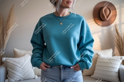 Teal sweatshirt mockup with gold necklace woman casual Product Image 1