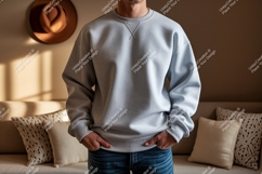 Gray sweatshirt mockup with hat and couch casual clothing Product Image 1