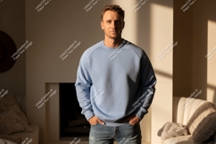 Man wearing blue sweatshirt and jeans indoor Product Image 1