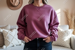 Woman wearing plum sweatshirt and jeans mockup Product Image 1