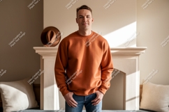 Man wearing orange sweatshirt blue jeans image Product Image 1