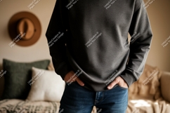 Man wearing dark grey sweatshirt blue jeans image Product Image 1