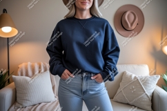 Woman wearing navy sweatshirt and jeans image Product Image 1