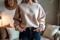 Woman wearing neutral sweatshirt and denim jeans Product Image 1