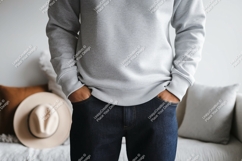 Gray sweatshirt dark jeans hands Product Image 1