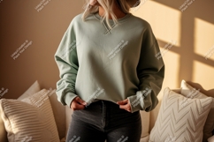 Woman wearing pastel green sweatshirt casual Product Image 1