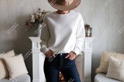 Woman wearing white sweatshirt and jeans image Product Image 1