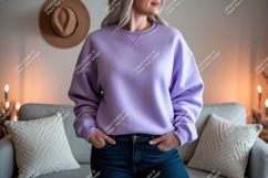 Woman wearing purple sweatshirt and blue jeans image Product Image 1