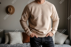 Man wearing beige sweatshirt dark jeans image Product Image 1