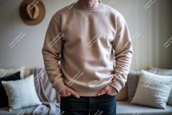 Man wearing beige sweatshirt and jeans casual Product Image 1