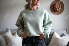 Woman wearing mint green sweatshirt casual Product Image 1