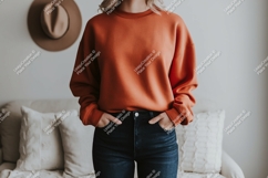 Orange sweatshirt dark jeans hat denim Product Image 1