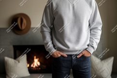 Gray sweatshirt dark jeans fireplace image Product Image 1