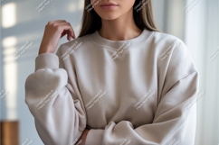 Woman in beige sweatshirt indoors mockup Product Image 1