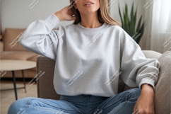 Woman wearing gray sweatshirt mockup Product Image 1