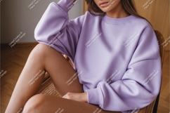 Woman in lilac sweatshirt mockup Product Image 1