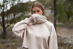 Woman wears beige hoodie mockup Product Image 1