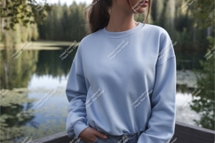Woman in blue sweatshirt posing mockup Product Image 1