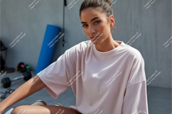 Woman in oversized tshirt at gym mockup Product Image 1