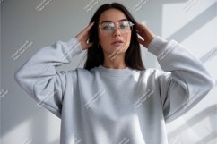 Woman in grey sweatshirt mockup Product Image 1