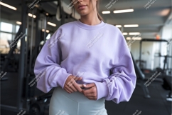 Woman in purple sweatshirt mockup Product Image 1