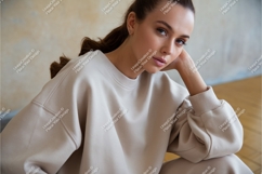 Woman in beige sweatshirt mockup Product Image 1