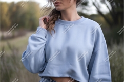 Woman in a blue sweatshirt outside mockup Product Image 1