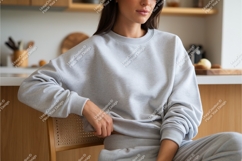 Woman in sweatshirt sitting indoor mockup Product Image 1