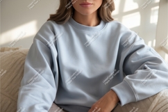 Woman in a blue sweatshirt mockup Product Image 1