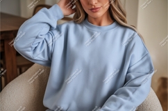 Woman in a blue sweatshirt mockup Product Image 1