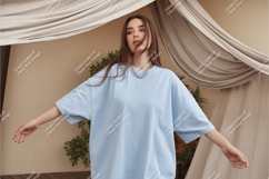 Woman in a blue tshirt mockup Product Image 1
