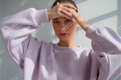 Woman in a lavender sweatshirt mockup Product Image 1