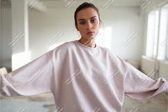 Woman in pink sweatshirt indoors mockup Product Image 1