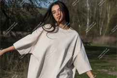 Woman in beige shirt in field mockup Product Image 1