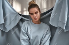 Woman in light blue sweatshirt mockup Product Image 1