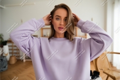 Woman in lavender sweatshirt mockup Product Image 1